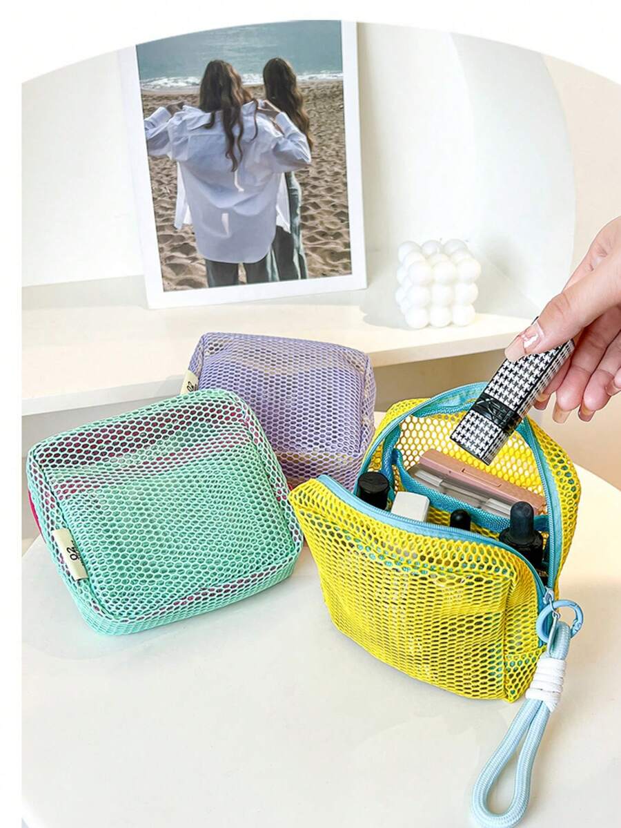 马卡龙网眼化妆包 | 分格收纳，一目了然，告别翻箱倒柜的烦恼，让美妆收纳变得轻松惬意。网眼透明设计：网眼材质让物品一目了然，无需翻找即可快速找到所需物品。 - 查看 1