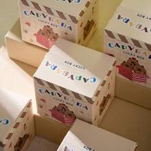 6/12个卡通生日惊喜礼盒，饰有水豚图案。内盒可放置独立首饰盒、小蛋糕和其他小礼物。每个盒子都包含一个幸运问号和卡通人脸图案，内含派对礼物、节日惊喜活动、寻宝游戏和抽奖奖品。采用坚固的纸板材质，主题独特。注意：此为空盒，不含任何礼物。 - 查看 7