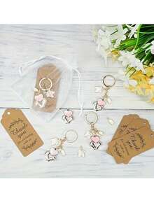 36件套粉蓝脚印钥匙扣礼盒，性别揭晓派对回礼，12套包含脚印瓶挂饰、钥匙扣、白色薄纱袋和牛皮纸感谢卡，12个创意钥匙扣+12张棕色感谢卡+12个白色薄纱礼品袋，成人礼物 - 彩色 - 查看 5