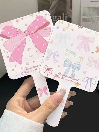 مرآة مكياج محمولة بتزيين فيونكة، مرآة مدمجة محمولة، مرآة تجميل بسيطة للسكن والمكتب قطعة واحدة/قطعتان