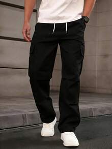 Homme Pantalones de carga con cintura con cordón y bolsillos, unicolor, para otoño - Negro - Ver 4