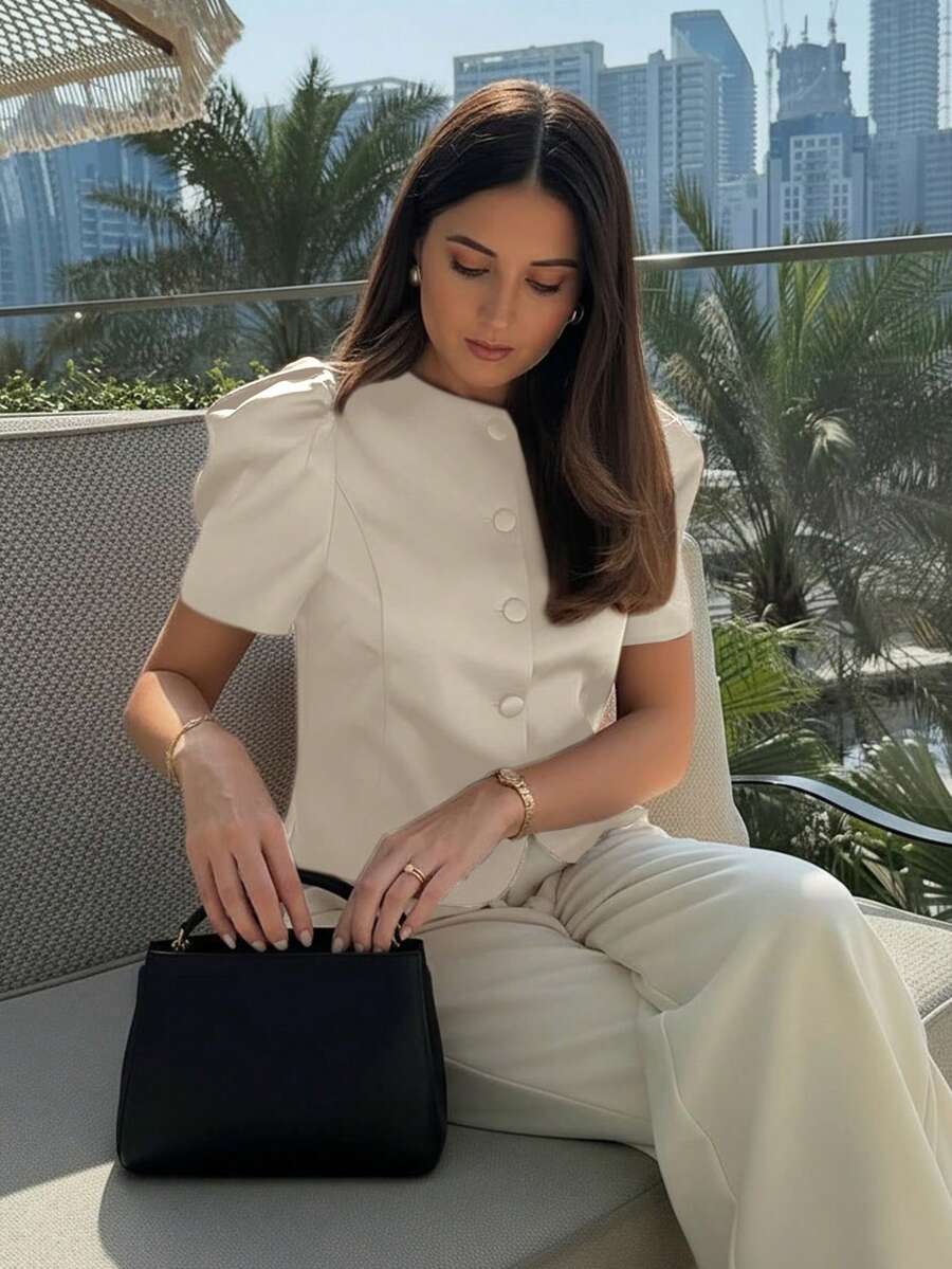Áo kiểu nữ màu nâu cổ tròn, tay phồng, cài cúc phía trước, áo blazer tay ngắn thời trang, thích hợp cho mùa hè. - Màu be - Xem 1
