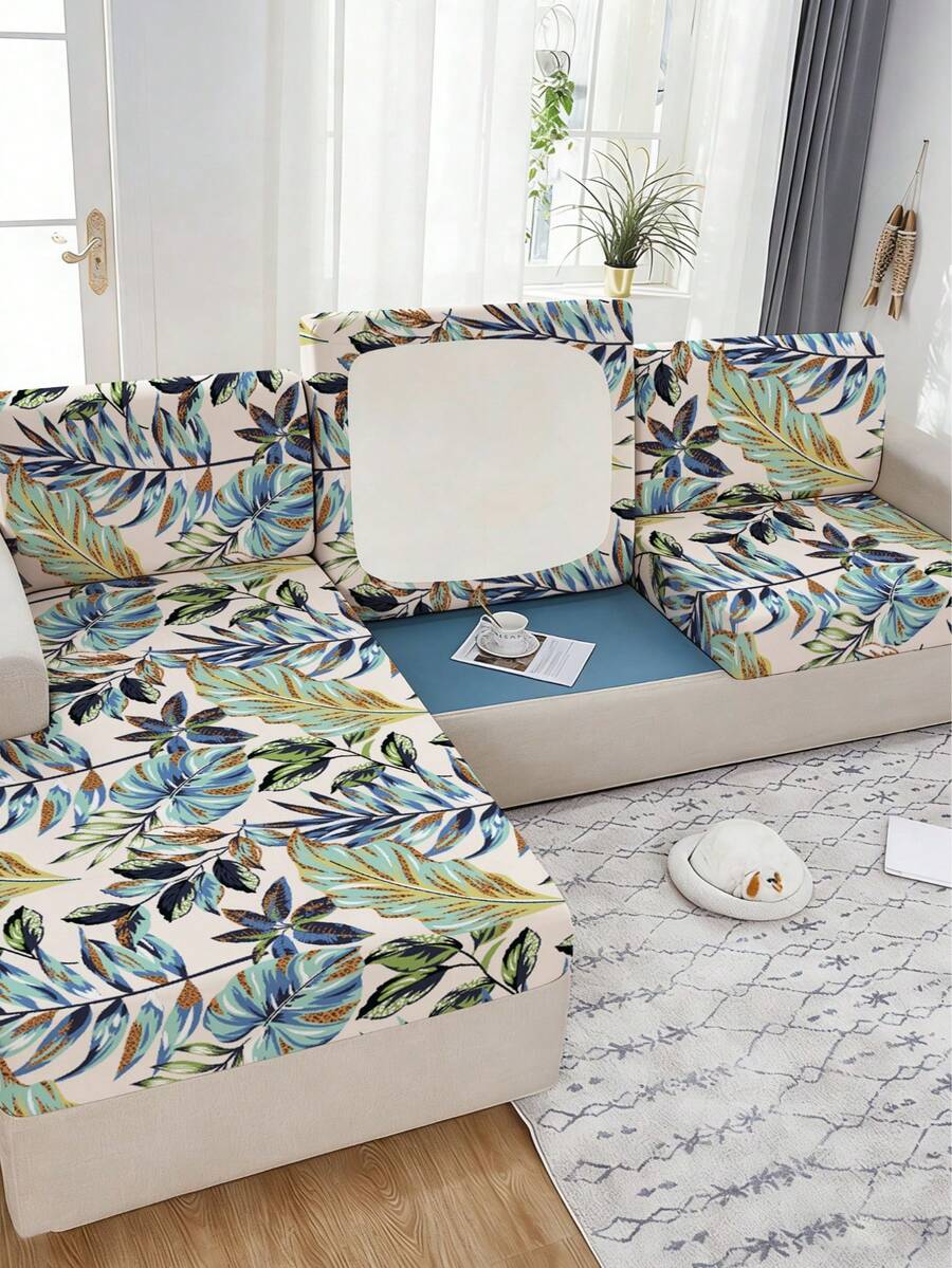 1 chiếc vỏ đệm ghế sofa co giãn in hình lá rừng nhiệt đới, phù hợp cho mọi mùa.