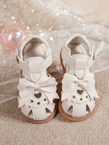 女童米色蝴蝶结爱心镂空露趾凉鞋 夏季儿童软底防滑平底公主鞋 - 米色 - 查看 3