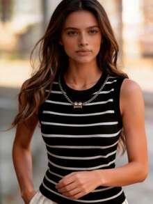 Áo tank top không tay cổ polo kẻ sọc đen trắng mới năm 2026, chất liệu dệt kim gân, dáng ôm sát, phong cách sinh viên, thích hợp cho mùa hè. - Đen và trắng - Xem 3