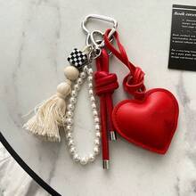 INS珍珠蝴蝶结包饰，少女时尚包包配饰，皮革心形钥匙扣吊坠，送给姐妹和闺蜜的新款礼物，可爱度假必备包包配饰，教师节礼物 - 彩色 - 查看 11