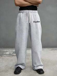 Quần thể thao nam thường ngày, thoải mái, thoáng khí, màu trơn, ống thẳng, có túi bên hông, kiểu dáng thể thao, thích hợp cho mùa xuân/thu, chất liệu vải dệt kim, bền chắc. - Xám - Xem 4