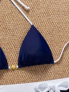 Bộ đồ bơi SunTide màu xanh hải quân, gồm áo bikini tam giác và váy viền trắng tương phản, set 2 món, thời trang và thanh lịch cho kỳ nghỉ hè ở bãi biển. - Xanh đậm - Xem 6