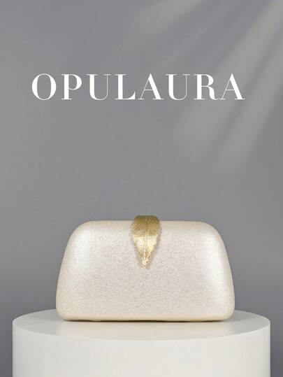 Túi xách cầm tay OpulAura 1 chiếc màu trắng, kiểu dáng cổ điển, chất liệu nhung, hình lá, có khóa cài, thích hợp cho các buổi tiệc tối trang trọng, đám cưới và các dịp trang trọng khác. Chiếc túi xách tinh tế và quyến rũ này là món quà lý tưởng dành cho phái nữ.