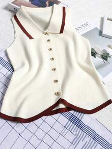 1 chiếc áo vest dệt kim không tay phối màu đen, trắng và nâu nhạt, kiểu dáng Pháp, ôm sát, cổ giả, thích hợp cho lễ hội và du lịch. - Nhiều màu - Xem 14