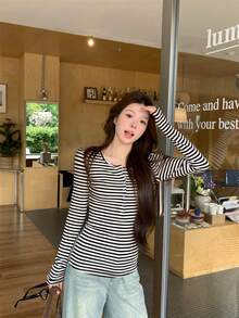 女士新款条纹长袖打底T恤，修身小众设计上衣，春季款 - 白色條紋 - 查看 2