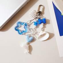 1 pieza Llavero con delfín y concha de estilo oceánico - Accesorio para bolso con colgante de estrella azul y corazón - Concha azul - Ver 2