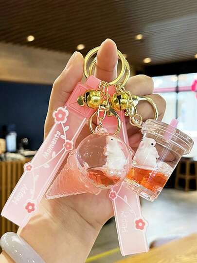 1 pieza Llavero con conejo de Sakura, colgante de conejo de dibujos animados lindo con líquido de arena movediza, llavero decorativo para bolsos, coches, en varias formas con un adorable conejito en el interior, campana dorada y pulsera de silicona, fácil de llevar
