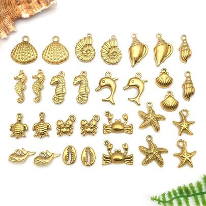 2 piezas Colgantes de metal de animales marinos de acero inoxidable dorado, con diseños de estrella de mar y delfín, para hacer joyería de verano y playa