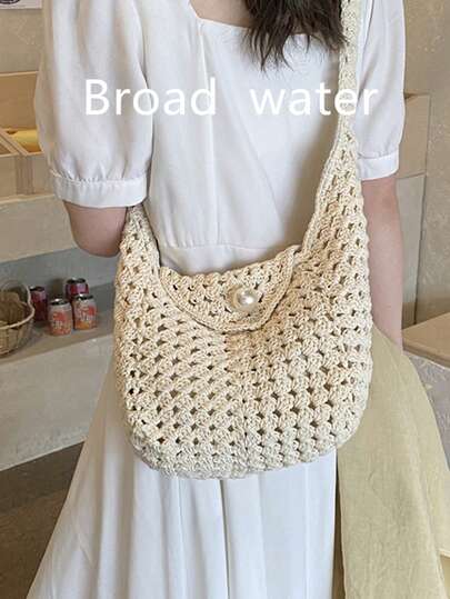 新款休闲手提包，手工草编大容量沙滩包，镂空设计