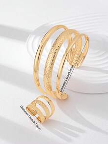1 Set de joyas de color dorado de metal de hierro que incluye pulsera tipo brazalete, anillo grueso y juego de anillos y pulseras a juego - Conjunto de pulsera y anillo de metal geométrico dorado - Ver 3