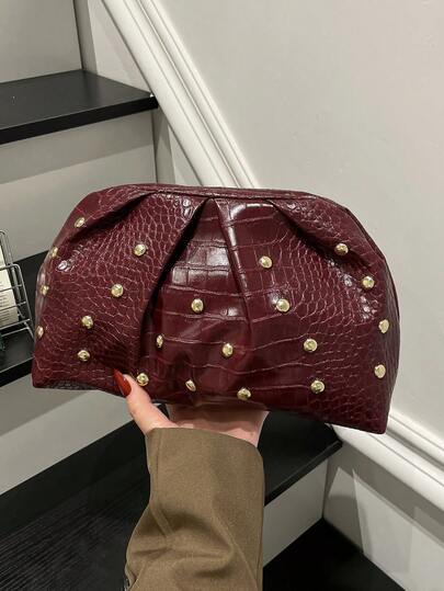 时尚优雅的纯色PU鳄鱼纹压花手拿包，适合日常、休闲、晚宴、聚会等场合。