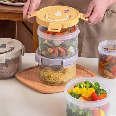 Hộp cơm trưa bằng nhựa trong suốt hình tròn 1100ml, hộp bento kín chống rò rỉ, hộp đựng trái cây và salad di động, hộp đựng thực phẩm hâm nóng bằng lò vi sóng, hộp bảo quản rau củ quả dung tích lớn dùng trong tủ lạnh, thích hợp cho học sinh và người lớn sử dụng ở trường, văn phòng, khi đi du lịch, cắm trại, dã ngoại, chuẩn bị cho năm học mới.