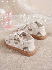 女童米色蝴蝶结爱心镂空露趾凉鞋 夏季儿童软底防滑平底公主鞋 - 米色 - 查看 6