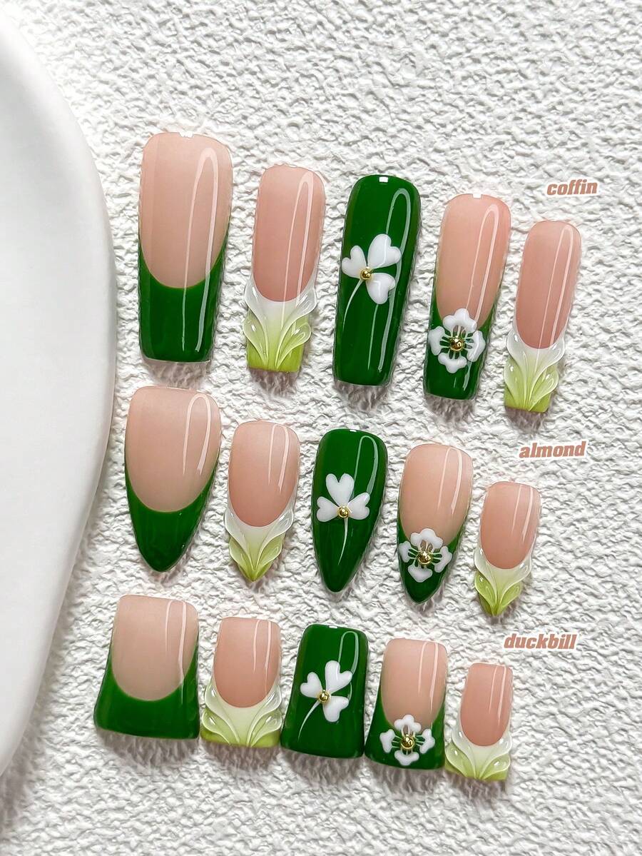 10件套铃兰复古风树脂美甲套装,包含白色心形和三叶草贴纸、金色珠子、手绘绿色和蓝色指甲油、指甲锉、1张果冻贴纸,有杏仁形、鸭嘴形和棺材形三种形状可选,按压式美甲贴片。 - 彩色 - 查看 1