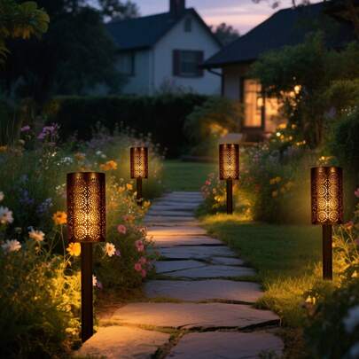 2/4pcs Solar Powered Hollow Flower Lawn Lights, Black Housing. These Modern Black Solar Garden Lights Emit Warm Lighting At Night. The Flower-Shaped Hollow Design Is Perfect For Decorating Lawns, Gardens, And Yards.