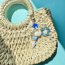 1 pieza Llavero con delfín y concha de estilo oceánico - Accesorio para bolso con colgante de estrella azul y corazón - Concha azul - Ver 8