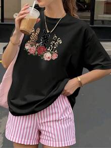 Blusas de manga corta para mujer camisetas de cuello redondo con diseños de Pascua con conejos de estampado animal print leopardo y flores rosas decorativas modas casuales suaves y cómodas tela tra - Negro - Ver 1