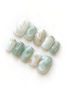 10 móng tay giả thủ công, hình bầu dục ngắn, màu xanh bạc hà ombre, kiểu dáng Trung Hoa thanh lịch với các đường nét và họa tiết hoa vàng vẽ tay, lấp lánh, nhẹ nhàng và duyên dáng, phù hợp cho phụ nữ và bé gái, lý tưởng cho mùa xuân, hè, thu, đông, lễ hội, tiệc tùng và sử dụng hàng ngày. - Màu xanh Bạc hà - Xem 2