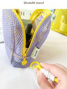 马卡龙网眼化妆包 | 分格收纳，一目了然，告别翻箱倒柜的烦恼，让美妆收纳变得轻松惬意。网眼透明设计：网眼材质让物品一目了然，无需翻找即可快速找到所需物品。 - 查看 2