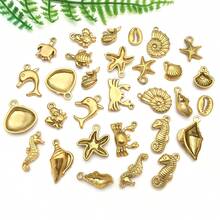 2 piezas Colgantes de metal de animales marinos de acero inoxidable dorado, con diseños de estrella de mar y delfín, para hacer joyería de verano y playa - Dorado - Ver 4