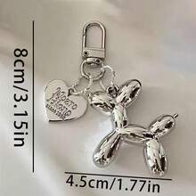 1个狗狗造型钥匙扣，适合作为汽车/包包装饰，是送给朋友的理想小礼物，也可作为汽车配件、包包装饰、学生礼物，具有哥特风、Y2K风格，配有证件卡套和挂绳，是送给母亲、父亲、毕业生和老师的礼物。 - 彩色 - 查看 5