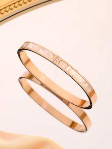 1条钛钢材质，镶嵌3颗水钻的高端白色贝壳手链，简约个性设计，永不褪色。 - 三鑽白貝手鐲 - 查看 3