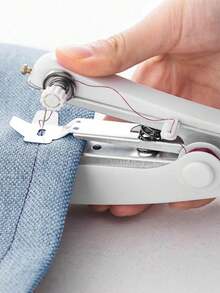 Mini Manual Sewing Machine, Integrated Sewing Machine, Fast Sewing Machine, Portable Sewing Machine, Portable Metal Sewing Machine, Multi-Functional Household Sewing Machine. This Is A Small, Easy-To-Carry And Operate Sewing Tool Suitable For Simple Sewing, Temporary Clothing Repair, And Other Scenarios. It Does Not Rely On The Fixed Power Supply And Large Space Required By Traditional Sewing Machines. - Multicolor - View 3
