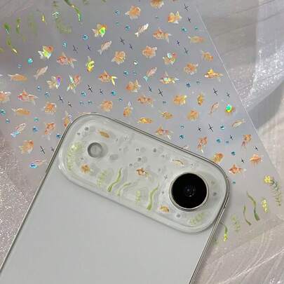 Miếng dán bảo vệ ống kính DIY hình cá vàng dễ thương chủ đề đại dương, miếng dán DIY hình bong bóng cá vàng laser trong suốt, bảo vệ màn hình camera, tương thích với iPhone 17 Pro Max 17 Pro 17 16 Pro Max 16 Pro 16 15 Pro Max 15 Pro Max 15 Pro 15 14 Pro Max 14 Pro 14 13 Pro Max 13 Pro 13. Miếng dán bảo vệ ống kính DIY mềm mại, phong cách, quà tặng sinh nhật mùa xuân.