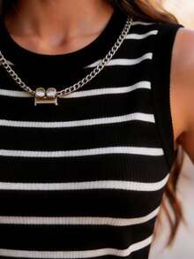 Áo tank top không tay cổ polo kẻ sọc đen trắng mới năm 2026, chất liệu dệt kim gân, dáng ôm sát, phong cách sinh viên, thích hợp cho mùa hè. - Đen và trắng - Xem 2