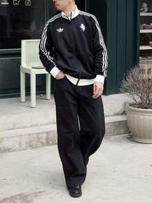 Áo bóng đá dài tay cổ đứng, dáng ôm vừa vặn, có khóa kéo toàn thân, hiệu adidas Originals Logo dành cho nam. - màu đen - Xem 4