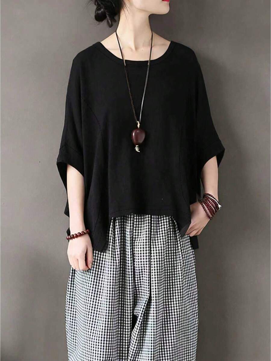 纯色宽松亚麻不规则下摆T恤，宽松七分袖圆领上衣，宽松修身设计，宽松蝙蝠袖独特款式，适合通勤和休闲穿着 - 黑色 - 查看 1