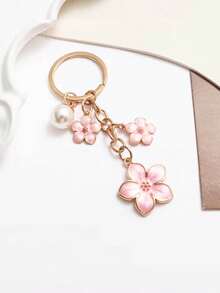 1 chiếc móc khóa hợp kim thời trang hình hoa giọt dầu và ngọc trai, với 3 bông hoa anh đào và mặt dây chuyền ngọc trai giả, phụ kiện trang trí túi xách hình hoa anh đào và hoa mai dễ thương, phụ kiện móc khóa tự làm dễ dàng. - Một kích cỡ phù hợp cho tất cả - Xem 7