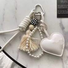 INS珍珠蝴蝶结包饰，少女时尚包包配饰，皮革心形钥匙扣吊坠，送给姐妹和闺蜜的新款礼物，可爱度假必备包包配饰，教师节礼物 - 彩色 - 查看 8