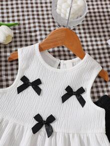 Conjunto de duas peças para meninas, composto por blusa sem mangas com laço e calça com detalhes em renda, ideal para a primavera/verão. - Branco - Ver 3
