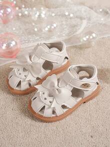 女童米色蝴蝶结爱心镂空露趾凉鞋 夏季儿童软底防滑平底公主鞋 - 米色 - 查看 7