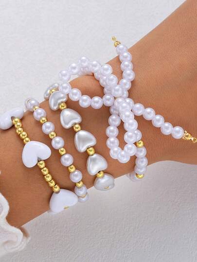 Set de 4 piezas de pulsera elegante con perlas falsas, cuentas de CCB con forma de corazón dorado y moño para mujeres