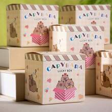 6/12个卡通生日惊喜礼盒，饰有水豚图案。内盒可放置独立首饰盒、小蛋糕和其他小礼物。每个盒子都包含一个幸运问号和卡通人脸图案，内含派对礼物、节日惊喜活动、寻宝游戏和抽奖奖品。采用坚固的纸板材质，主题独特。注意：此为空盒，不含任何礼物。 - 查看 5