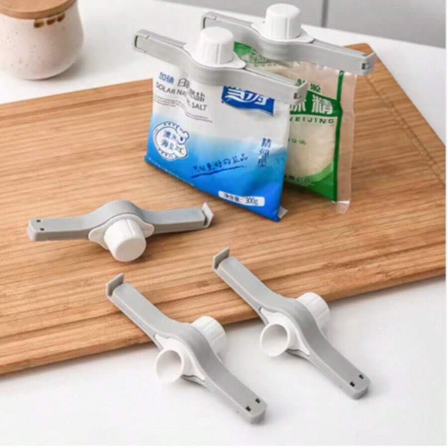 1 chiếc kẹp niêm phong bằng nhựa đa chức năng với vòi rót và thiết kế nắp xoay, giúp niêm phong hiệu quả các túi thực phẩm và dễ dàng phân phối, kết hợp chức năng bảo quản kín khí và phân phối theo khẩu phần, niêm phong chắc chắn để ngăn ngừa hơi ẩm và côn trùng, kéo dài độ tươi ngon của ngũ cốc và đồ ăn nhẹ.