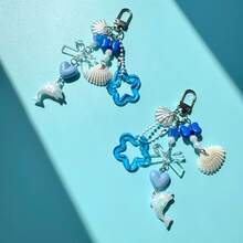 1 pieza Llavero con delfín y concha de estilo oceánico - Accesorio para bolso con colgante de estrella azul y corazón - Concha azul - Ver 6