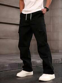 Homme Pantalones de carga con cintura con cordón y bolsillos, unicolor, para otoño - Negro - Ver 3