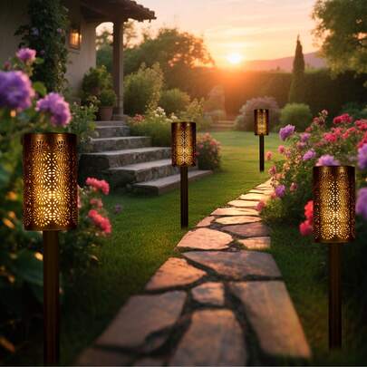 2/4pcs Solar Powered Hollow Flower Lawn Lights, Black Housing. These Modern Black Solar Garden Lights Emit Warm Lighting At Night. The Flower-Shaped Hollow Design Is Perfect For Decorating Lawns, Gardens, And Yards.