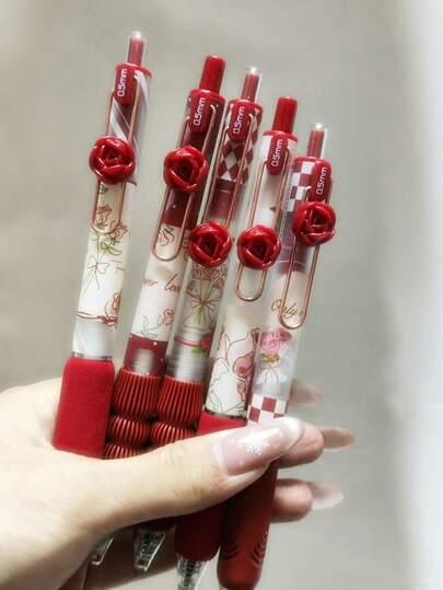 一盒5支装玫瑰花形自动伸缩软握笔，0.5毫米笔尖，速干墨水，适合学生考试，最佳情人节礼物，返校必备，学生用品，红色、粉色、紫色和绿色可选