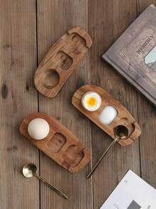 两件套木制鸡蛋托盘，含勺子和调味碟。这款木制鸡蛋托架专为溏心蛋设计，采用红木制成，包含鸡蛋托盘、蛋杯和蛋壳杯架。 - 彩色 - 查看 4