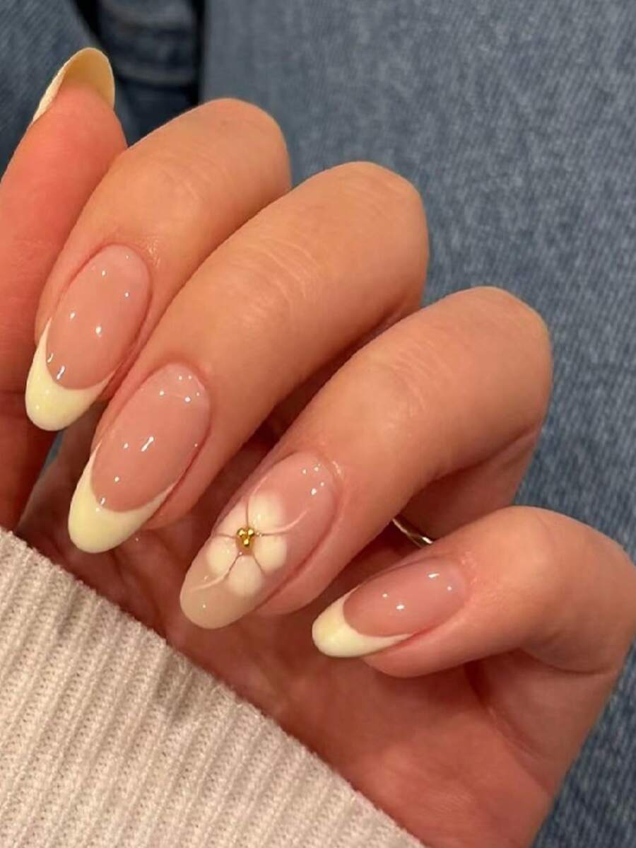 24片杏花美甲贴纸，饰有小金属珠，黄色法式尖头设计，杏仁形状完美贴合指甲，是亚克力假指甲的理想之选。套装包含：1瓶果冻胶和1把指甲锉。花卉美甲和法式美甲，适合女性日常工作、节日派对和各种场合。 - 彩色 - 查看 1